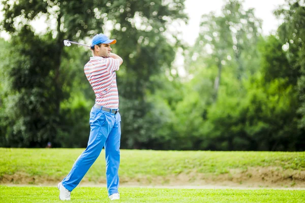 Golfer practicing  before and after shot