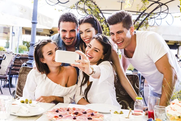 Group of people taking a selfie