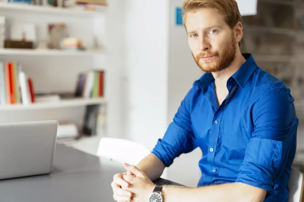 Confident ginger businessman