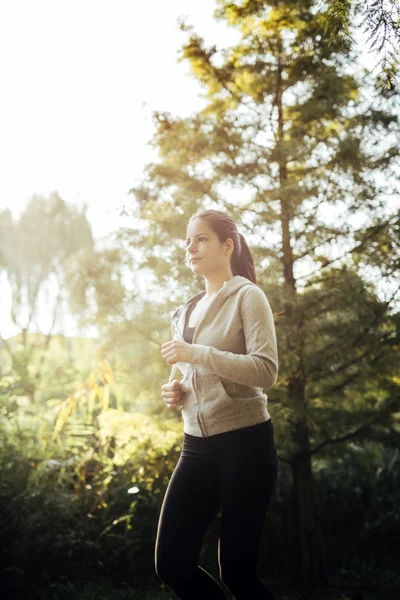 Woman running in park