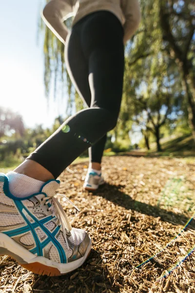 Woman running in park