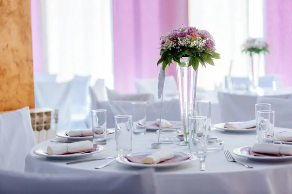 Beutiful wedding setting with bouquet