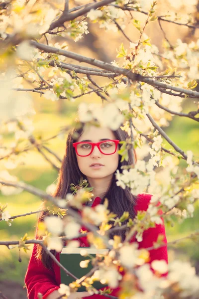 Brunette woman with book