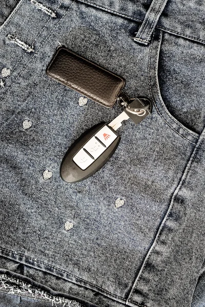 Smart car key over girl jeans - instargram color tone