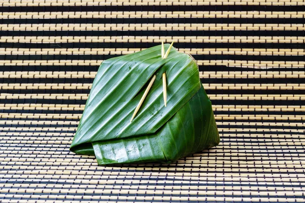 Packaging of banana leaves for sticky rice thai sweet dessert