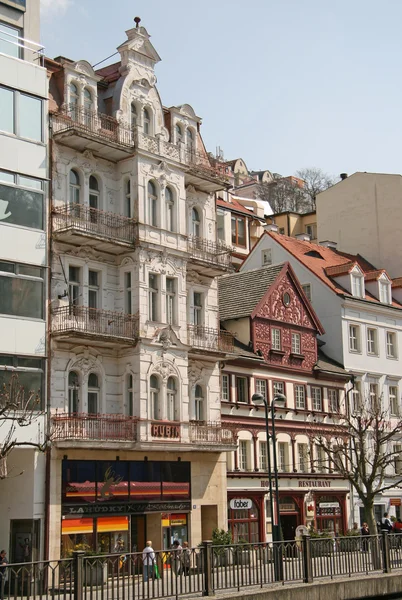 KARLOVY VARY, CZECH REPUBLIC - APRIL 20, 2010: Buildings in Karlovy Vary or Carlsbad that is a spa town situated in western Bohemia, Czech Republic