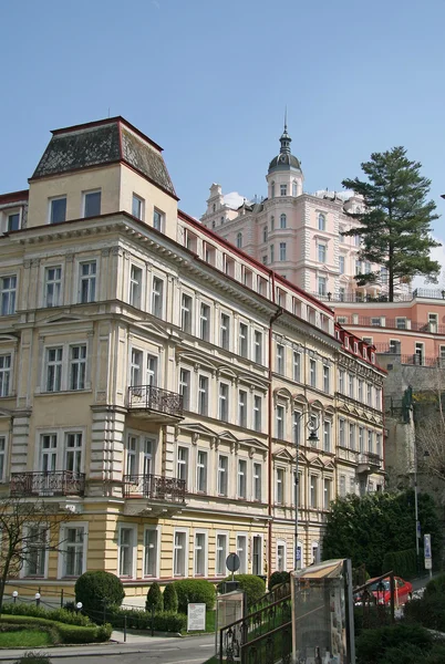 KARLOVY VARY, CZECH REPUBLIC - APRIL 20, 2010: Buildings in Karlovy Vary or Carlsbad that is a spa town situated in western Bohemia, Czech Republic