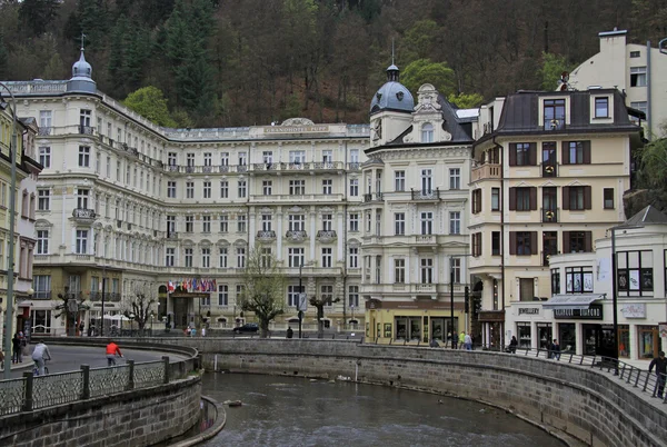 KARLOVY VARY, CZECH REPUBLIC - APRIL 27, 2013: Buildings in Karlovy Vary or Carlsbad that is a spa town situated in western Bohemia, Czech Republic