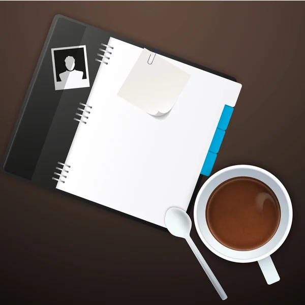 Workspace with coffee cup, instant photos, note paper