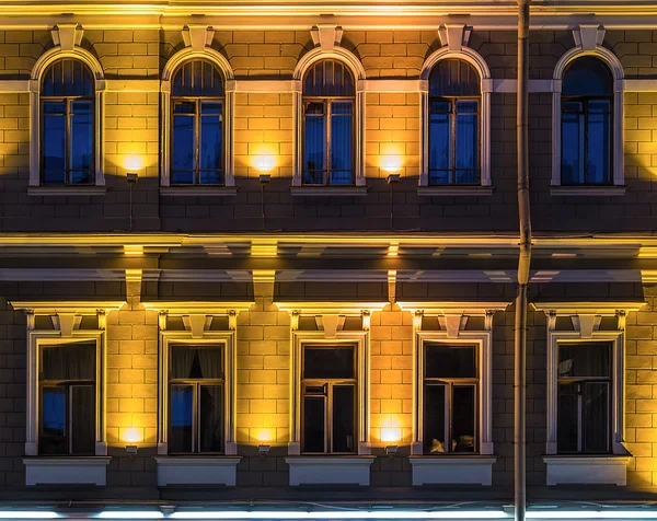 Windows on night facade of office building