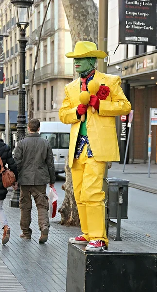 Man in yellow costume in street of Barcelona
