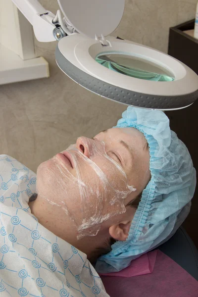 Professional acne facial cleansing in the cabin