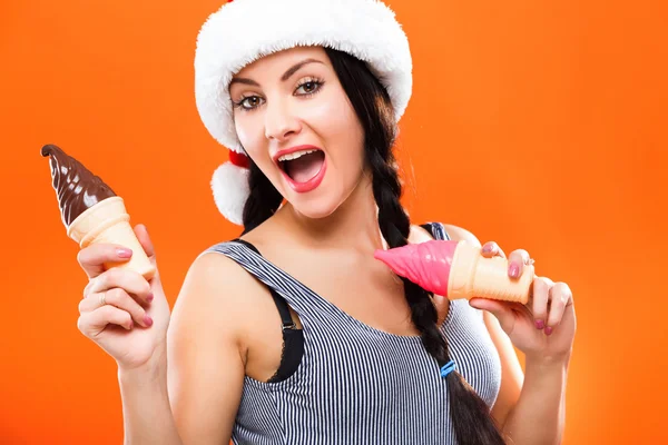 Smiling young girl with ice creams