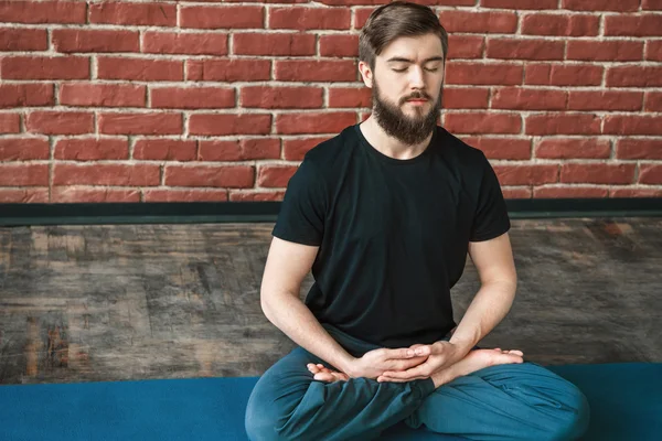 Yoga positions at wall background