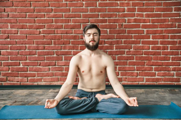 Yoga positions at wall background