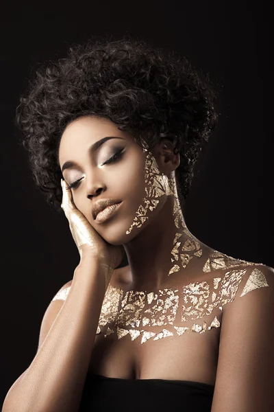 African American model in gold