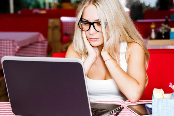 Gorgeous young woman in cafe