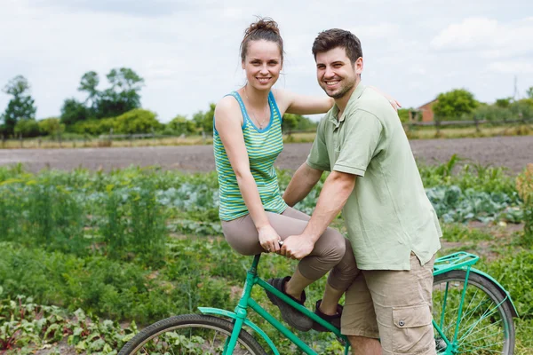 Beautiful couple with bicycle