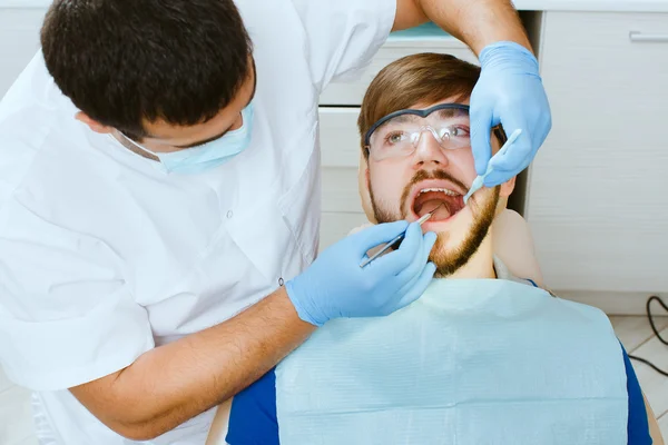 Top view of dentist taking a dental attendance