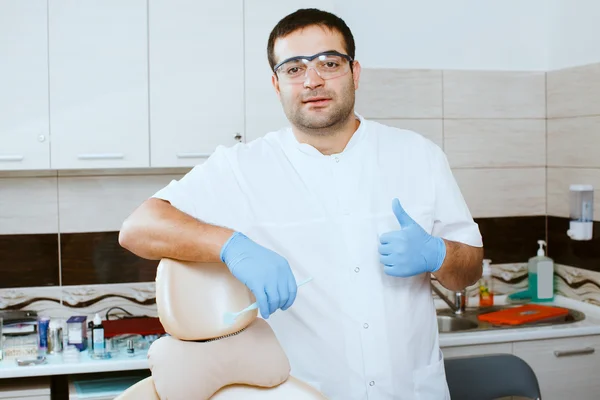 Dentist showing thumbs up