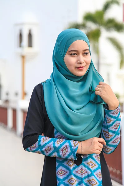 Young muslim woman at  Mosque in Kuala Terengganu, Malaysia