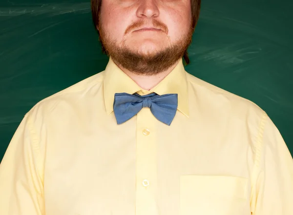 Blue bow-tie with yellow shirt
