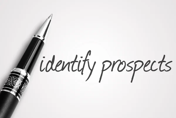 Pen writes identify prospects on white blank paper