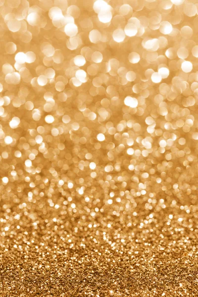 Golden sparkle. Glitter background.