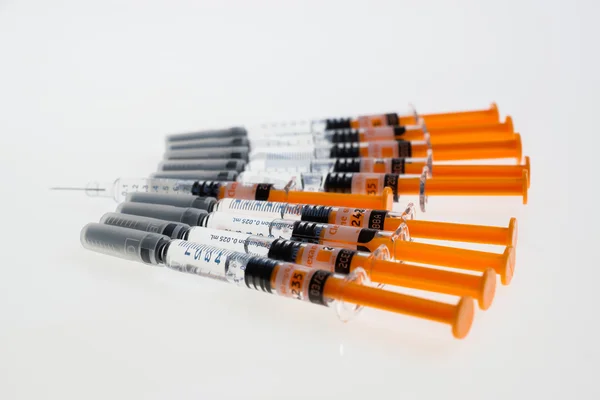 Syringes small orange