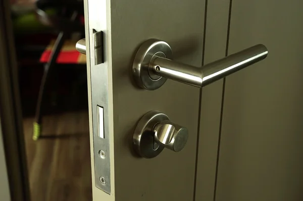 Grey door and silver knob