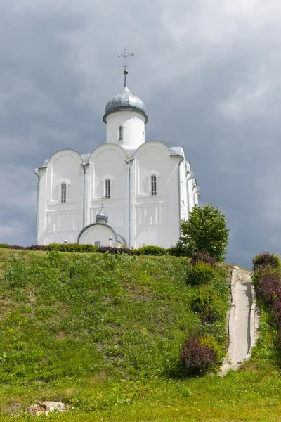 Landscape with the Russian Orthodox Church and cloudy sky.