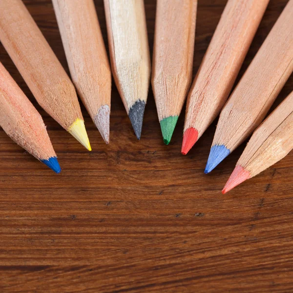 Coloured pencils on wood