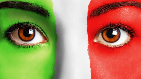 Woman face painting italian flag