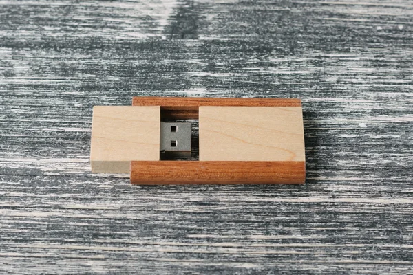 Creative wooden usb stick on dark background