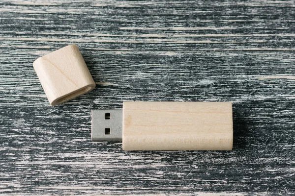 Creative wooden usb stick on dark background