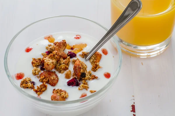 Breakfast - granola, yogurt and jam