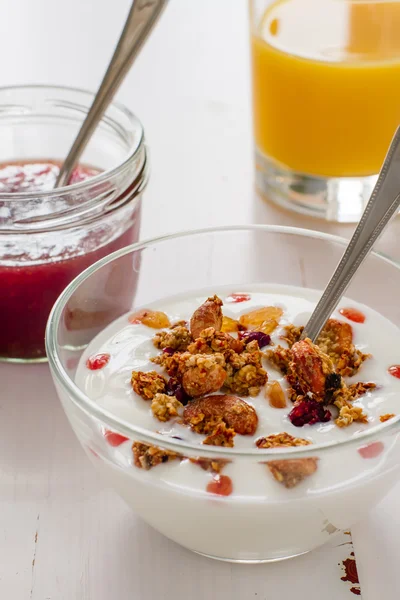 Breakfast - granola, yogurt and jam