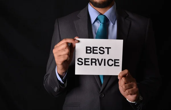Best Customer Service - professional holding sign in hands
