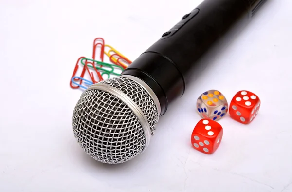 Microphone with paper holding pins and dice - Motivational Speaker