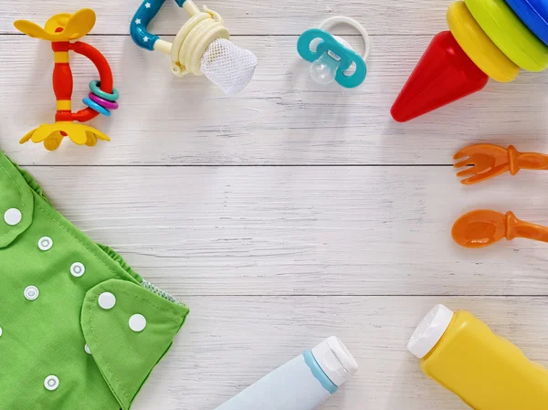 Collection of items for babies with copy space
