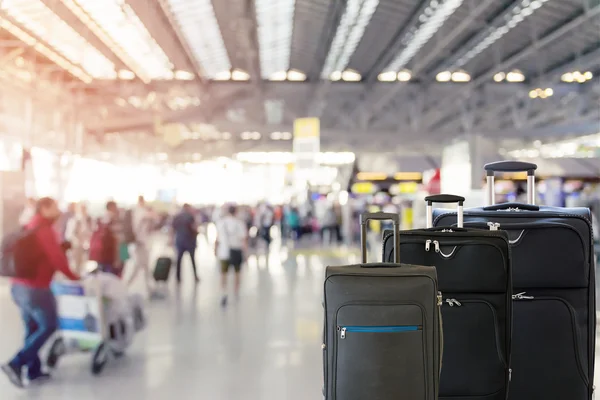 Group of luggage in the airport terminal.