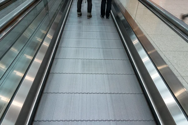 Automatic escalators in various places and buildings.
