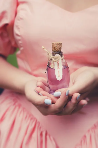 Alice in Wonderland, Alice through the looking glass, fairytale, drink me, drug, magic potion, key, hands, female, dress, magic potion in hand, bottle, becoming more become less