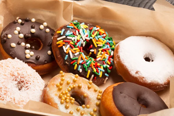 Donuts with sprinkles in a box