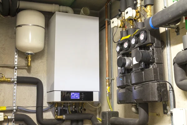 Condensing gas boiler in the boiler room