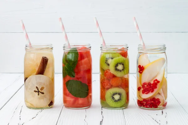 Detox fruit infused flavored water. Refreshing summer homemade cocktail. Clean eating.