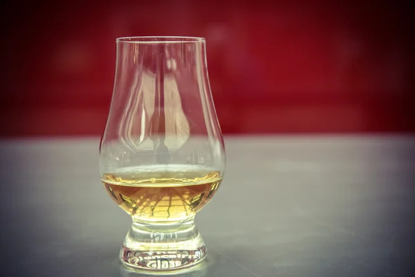 Golden whiskey glass