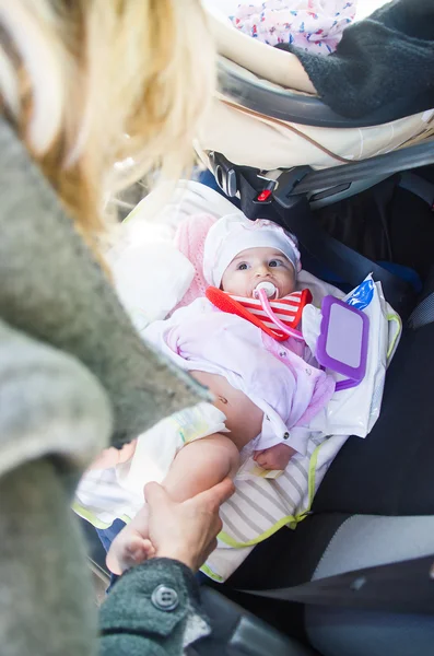 Newborn lay car seat mom change diapers travel babies