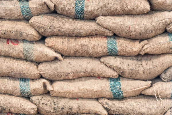 Stack of sack bags inside warehouse