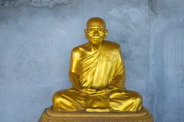 Golden Buddhist Monk Statue